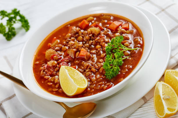 istock lentil soup with vegetables and lemon wedges 1198057933
