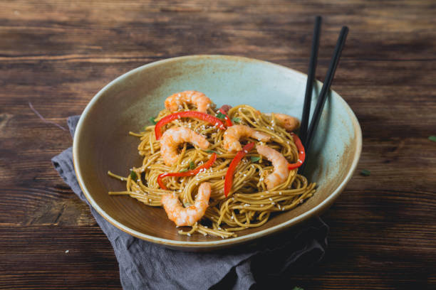 istock Egg noodles with bell pepper and shrimp 1198057985