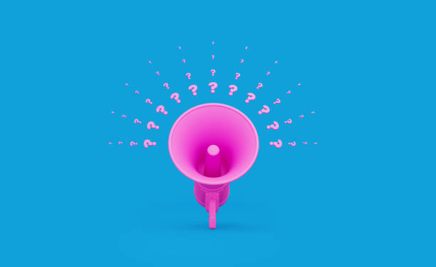 Pink Megaphone and Question Marks over Blue Background