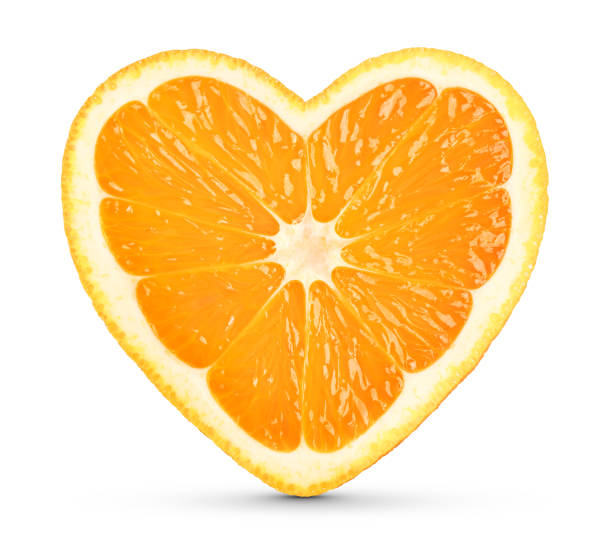 concepto de corazón naranja sobre blanco - valentines day food photography indoors fotografías e imágenes de stock