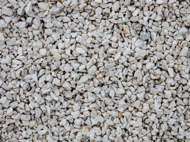 istock Grey gravel road. Old stone grunge texture background. 1198066019