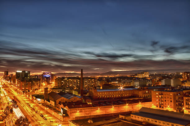 istock High angle shot of Barcelona, Spain at twilight 119807070
