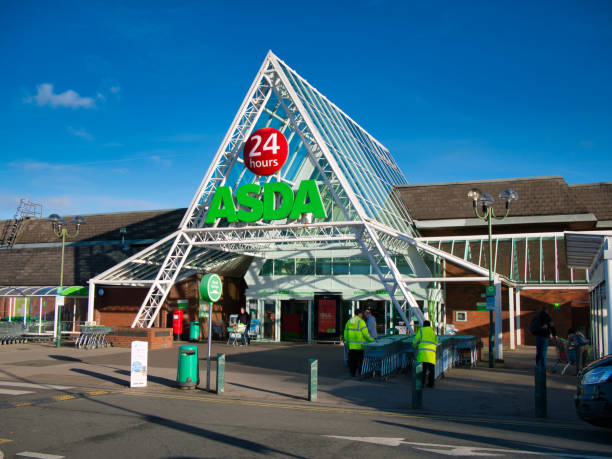 The frontage of the Bromborough store of the Walmart owned ASDA British supermarket chain The frontage of the Bromborough store of the Walmart owned ASDA British supermarket chain, located at an out of town retail park in the North of England. asda photos stock pictures, royalty-free photos & images