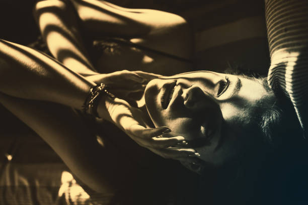 Girl is lying on the bed