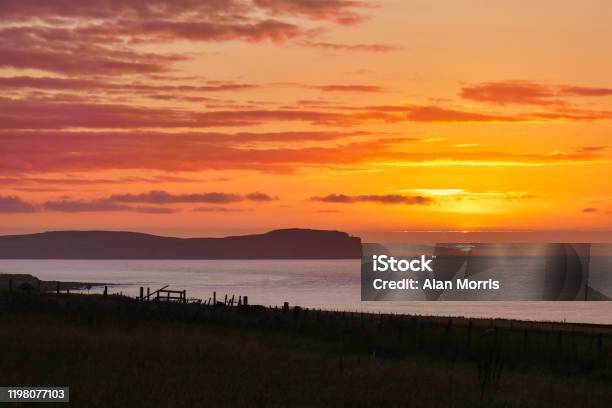 Sunset Over Dunnet Head In Caithness Scotland Uk Stock Photo - Download Image Now - Beach, Beauty, Caithness