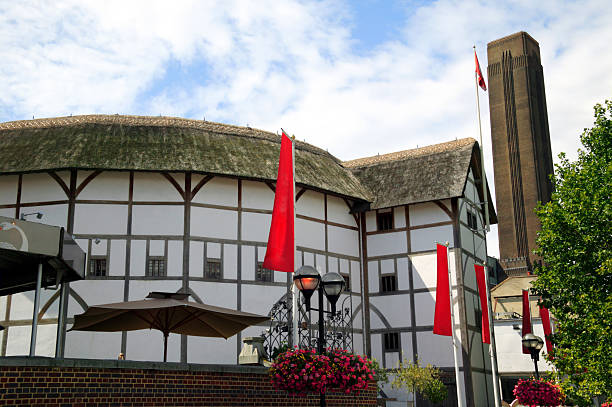 William Shakespeare's Globe Theatre William Shakespeare Globe Theatre which is situated beside the River Thames on London's South Bank opposite St Paul's Cathedral and next to the Tate Modern in England elizabethan style stock pictures, royalty-free photos & images