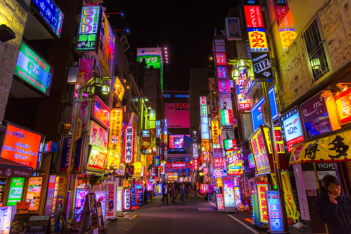 Tokyo, Japan - November 13, 2014:: Billboards in Shinjuku's Kabuki-cho district November 13, 2014 in Tokyo, JP. The area is a nightlife district known as Sleepless Town.