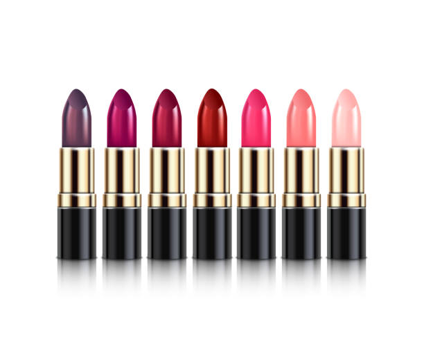 istock Realistic set of different lipstick color palette in shiny gold and black packaging. 1198079922