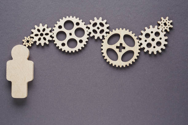 istock Abstract man with gears - concepts of business,  functioning, efficiency, interlocking parts. 1198082416