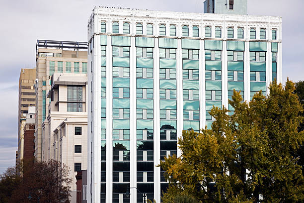 Picture of a building exterior in Sacramento California.  One of many corporate buildings in the financial district of Sacramento, this building had a unique aspect with its glass and geometric designs.