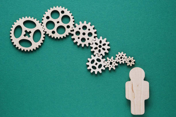 istock Abstract man with gears - concepts of business,  functioning, efficiency, interlocking parts. 1198082626