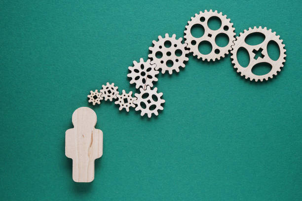 istock Abstract man with gears - concepts of business,  functioning, efficiency, interlocking parts. 1198082631