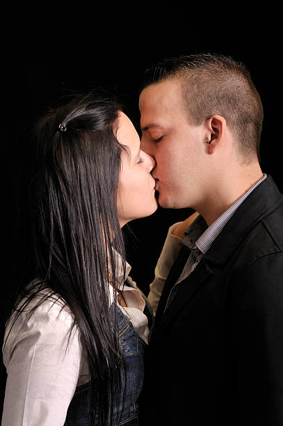 istock young kissing couple 119808332