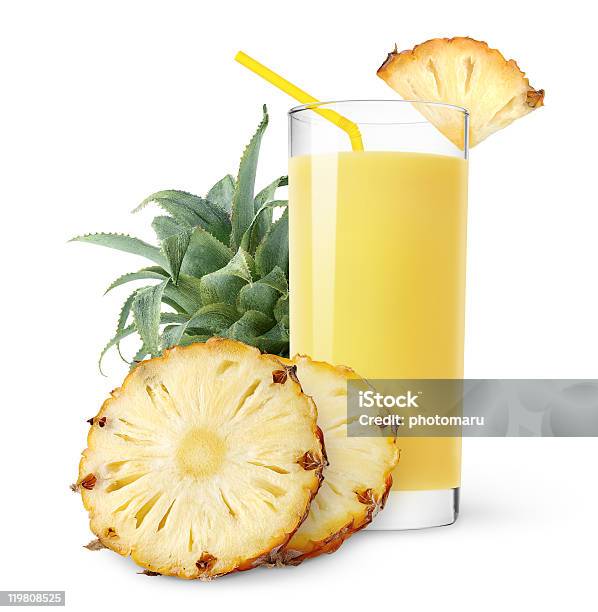 Glass Of Pineapple Juice Decorated With Pineapple Slice Stock Photo - Download Image Now