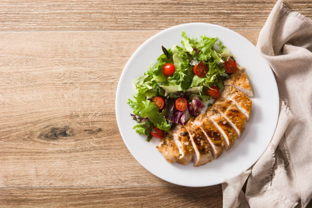istock Grilled chicken breast with vegetables 1198086030