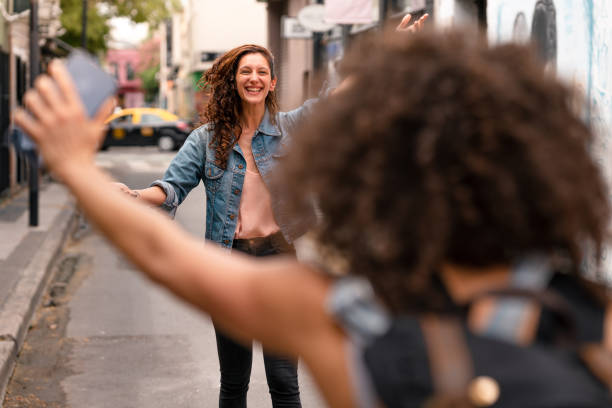 istock Best friends meeting and embracing 1198086563