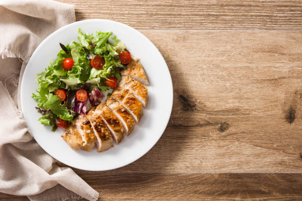 istock Grilled chicken breast with vegetables 1198086647