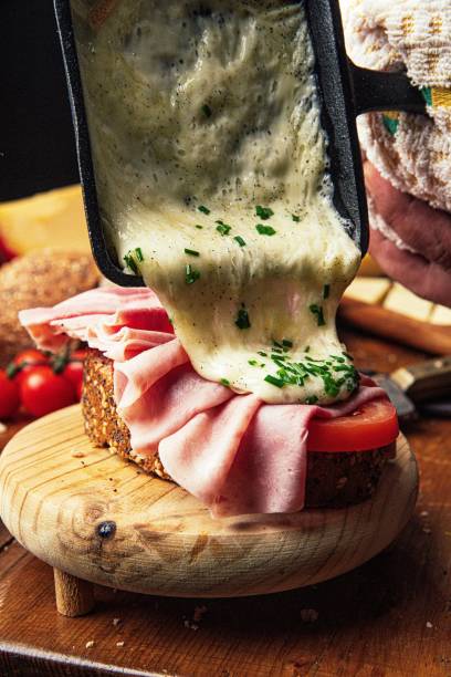 сыр - raclette cheese стоковые фото и изображения