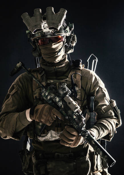 istock Anti-terrorist squad equipped fighter soldier in darkness 1198089919