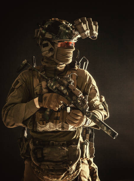 istock Anti-terrorist squad equipped fighter soldier in darkness 1198089946