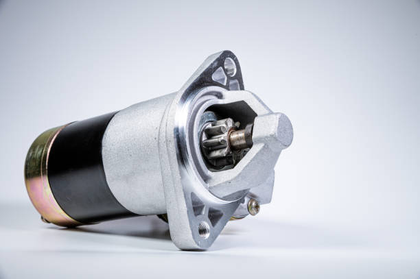 istock Starter of an internal combustion engine New Spare part for car on a gray background 1198093576