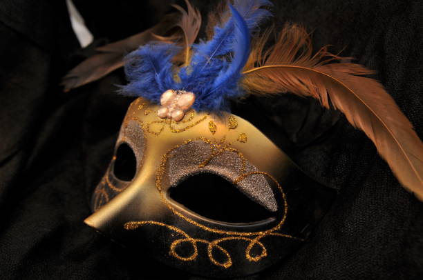 istock Carnival mask photography on black background 1198093826