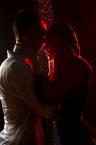 istock Young casually dressed couple shot in shower 1198094866