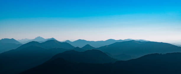 istock a day in the mountains with bright blue sky 1198095009