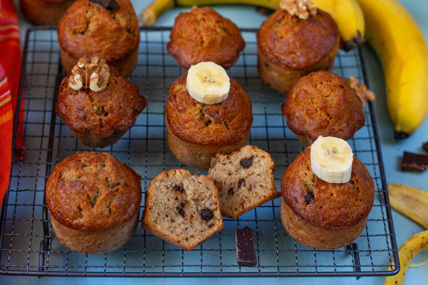 istock Sweet banana bread muffins with chocolate chips and walnuts 1198096280