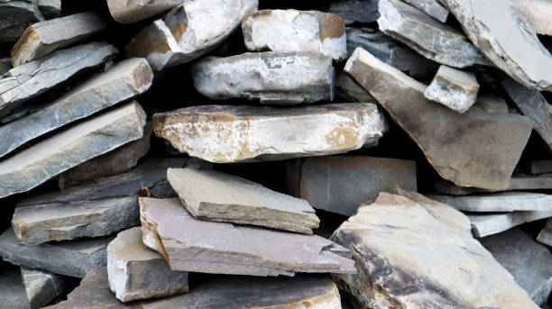 istock The texture of the stone wall. Old castle stone wall texture background. Stone wall as a background or texture. Part of a stone wall, for background or texture. pattern gray color modern style design 1198096642