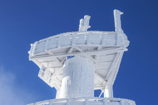 istock Snow-covered observation tower. Heavy snow on the building 1198098685