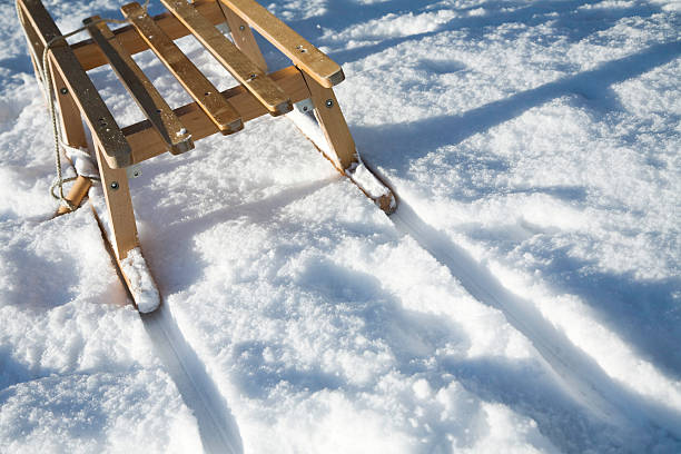old wooden sledge on white background