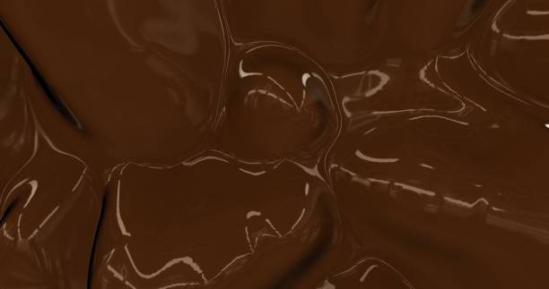 istock Liquid hot chocolate background. Melted dark chocolate texture 3D rendering . Glamour silk backdrop animation 1198100352