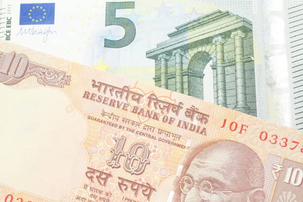 istock Ten Indian rupees with five Euro note 1198101703