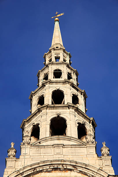 The spire of St Bride's Church designed by Sir Christopher Wren in 1672  stands on Fleet Street in the city of London, England,. It is said to be the inspiration for the tiered wedding cake