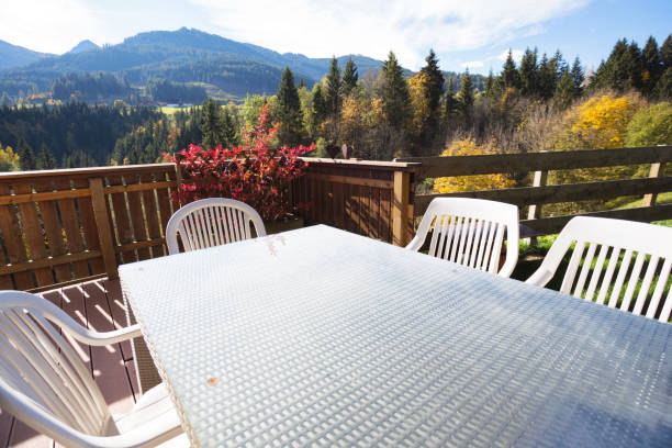 istock cozy terrace with a table and chairs in the mountains