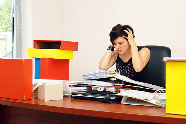 istock Despaired woman overloaded with work 119810644