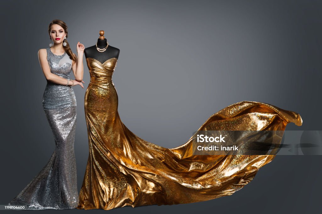 Woman Evening Dress, Fashion Gown on Tailor Dummy, Elegant Gold Silver Clothes Models Woman Evening Dress, Fashion Gown on Tailor Dummy, Elegant Gold Silver Clothes Models studio Portrait Dress Stock Photo