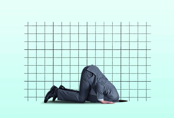 istock Head In Financial Hole 1198106837