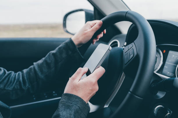 istock Texting and driving is dangerous behavior in traffic 1198110258