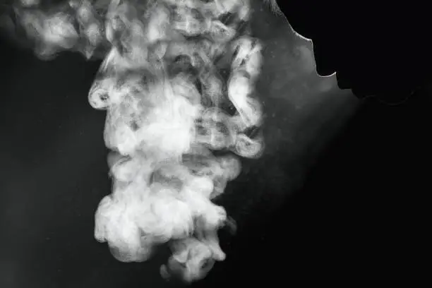 Photo of Black and white photography of man and his steamy breath