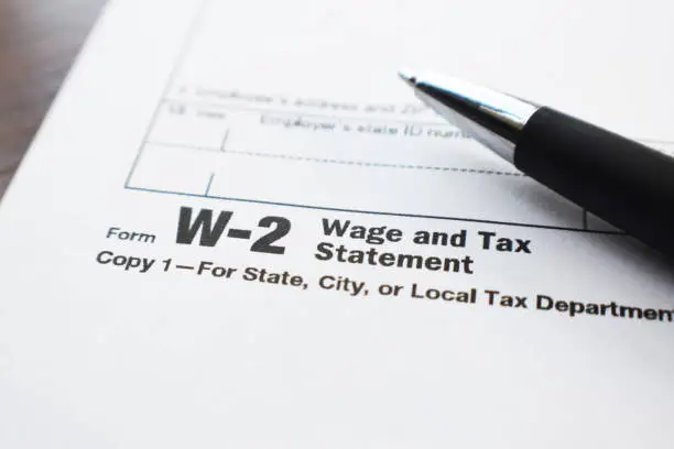 Photo of Tax Form W-2 Close Up With Pen High Quality