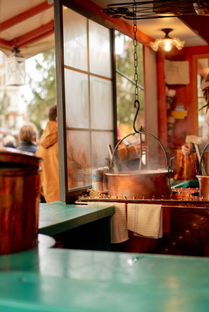 istock mulled wine pan on Christmas market 1198116245