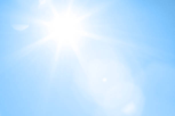 istock Bright sun with beautiful beams in the sky 1198117058