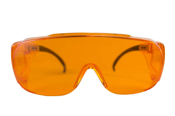 istock orange protective glasses in dentistry for work with UV lamp 1198123951