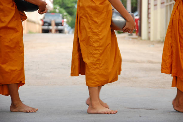 istock Lots of monk in the line or queue 1198124003