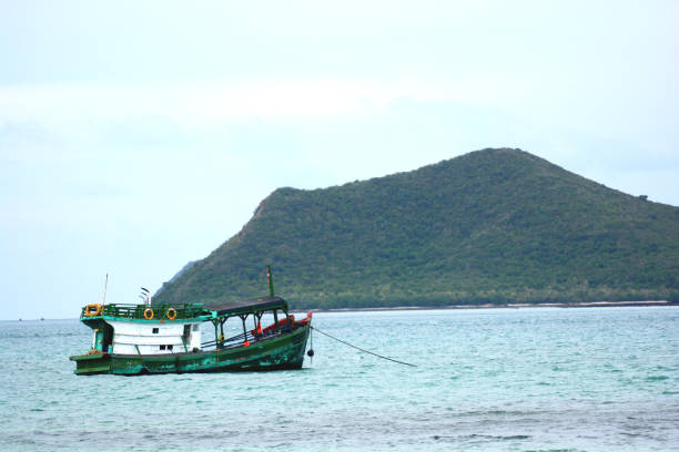 istock row boat float on the sea 1198124051