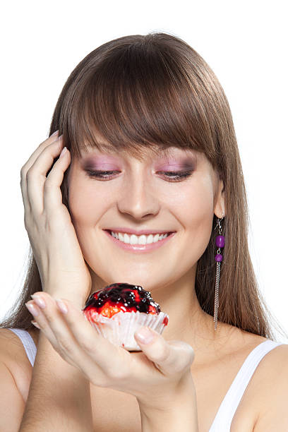 istock happy girl with cake isolated 119812611