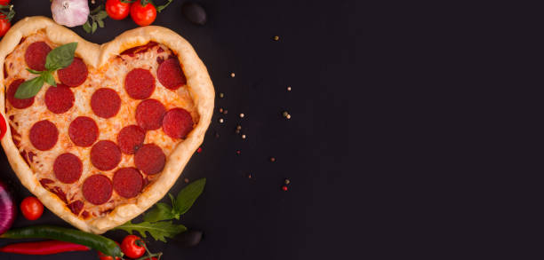 istock Pizza heart shaped with pepperoni 1198127806