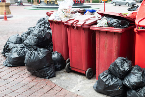 istock Red trash and black bags put garbage on the floor, environmental concept 1198131318